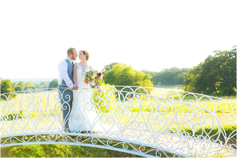 bride and groom in gazebo