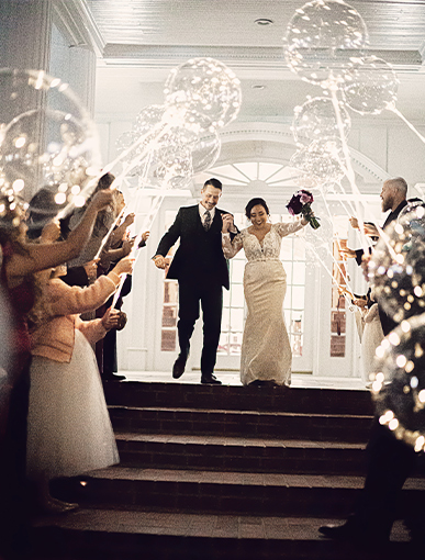 send off of a bride and groom with bubble lights