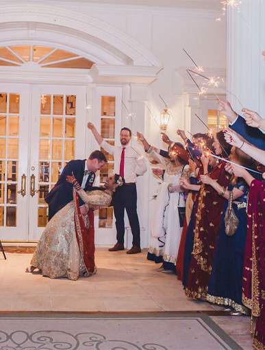 bride and groom send off with sparklers