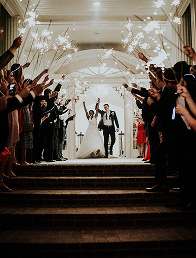 bride and groom send off with sparklers