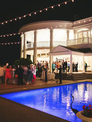 reception out by the mansion pool