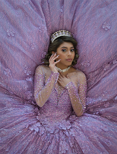 Girl in a beautiful shiny purple Quinceañeras dress