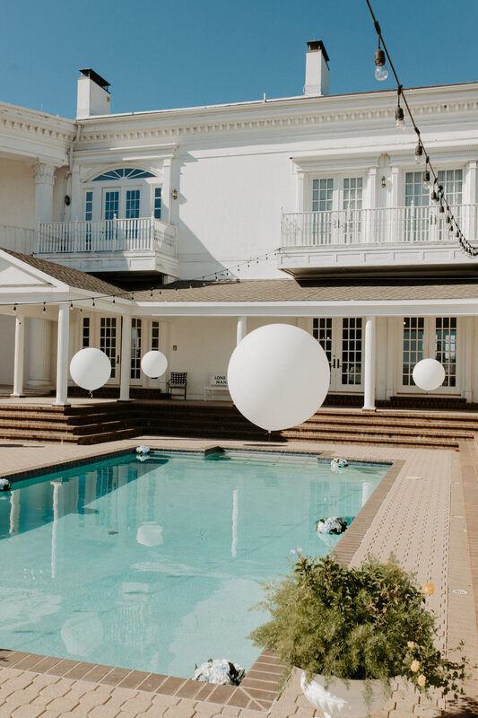 the pool in back of the mansion